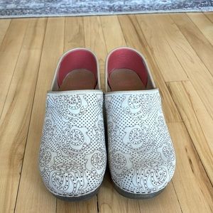 Dansko clog, size 37. Tan leather with rose design. Brand new, never worn.